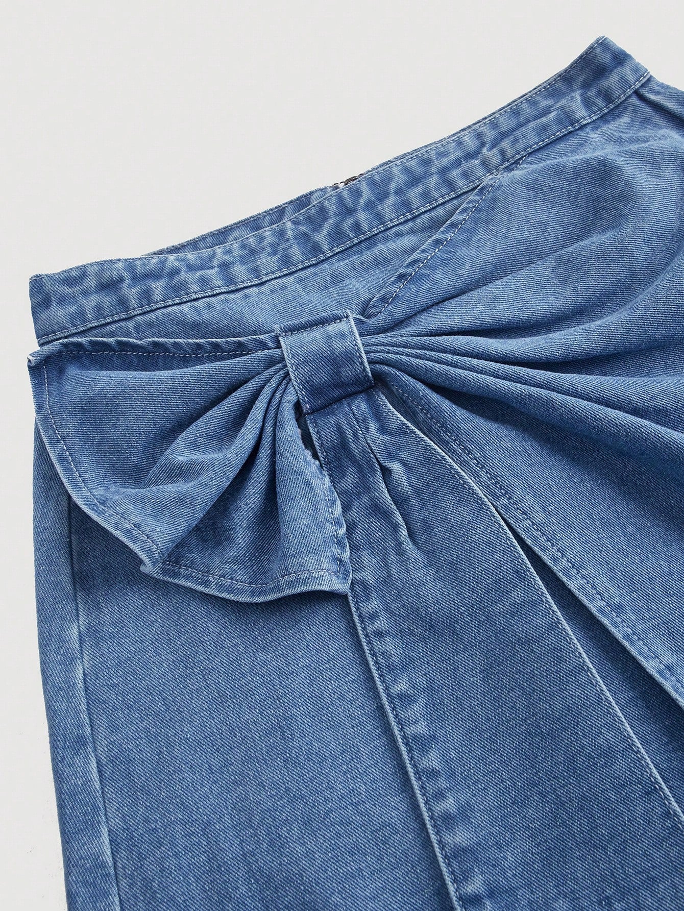 Chic High-Waisted Denim Mini Skirt with Bowknot Detail for a Stylish Look