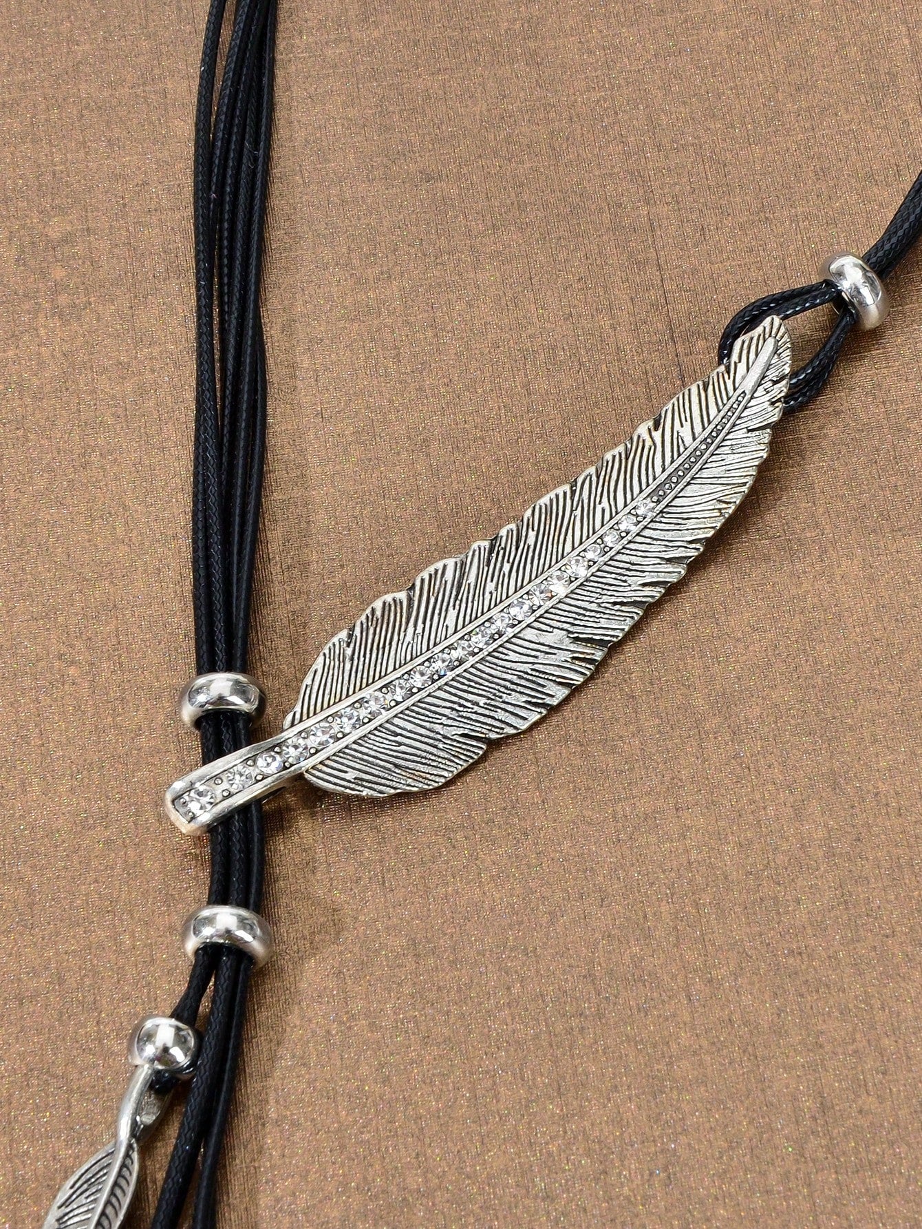 Bohemian Chic: Handmade Black PU Rope Necklace with Antique Silver Feather Pendant