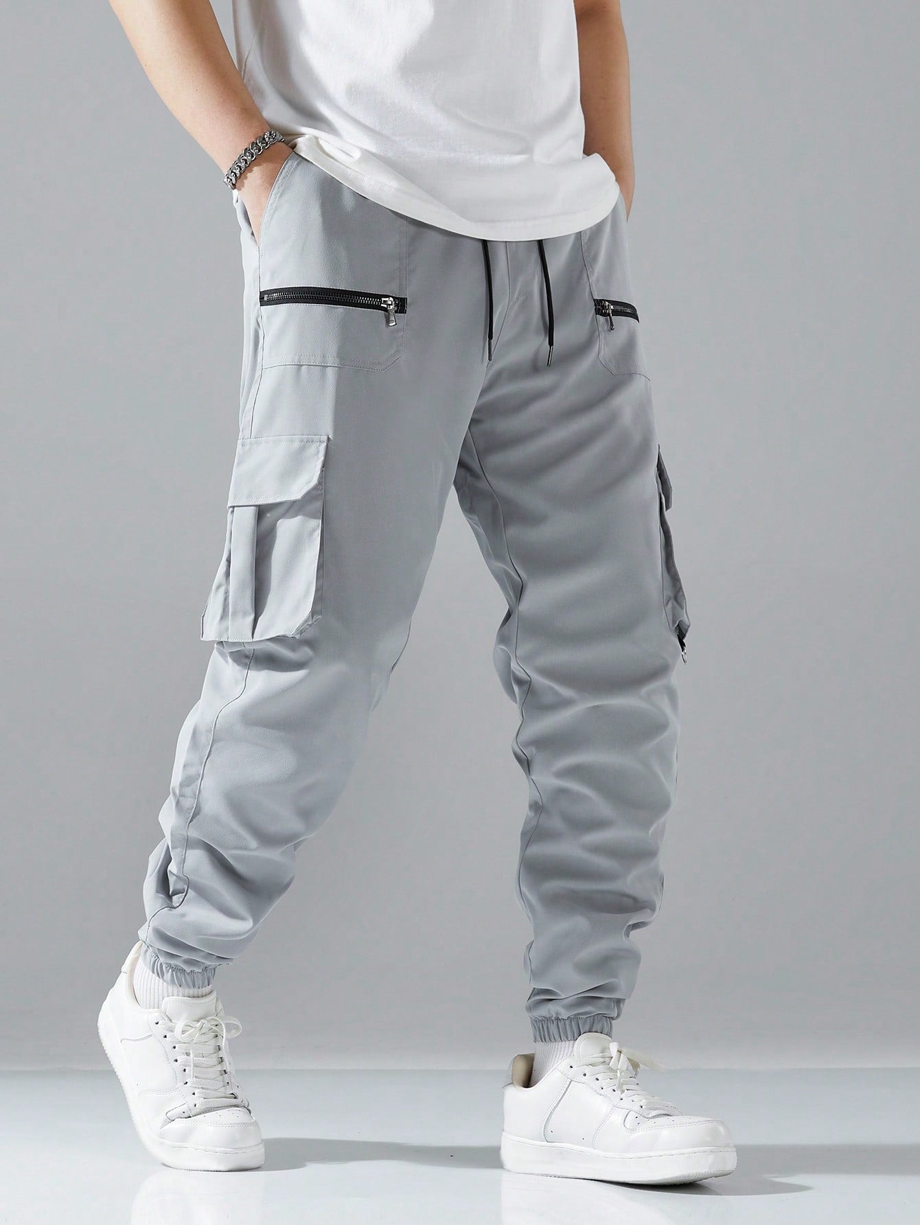 Loose Fit Cargo Pants with Flap Pockets and Drawstring Waist for Ultimate Comfort Black / S Black / M