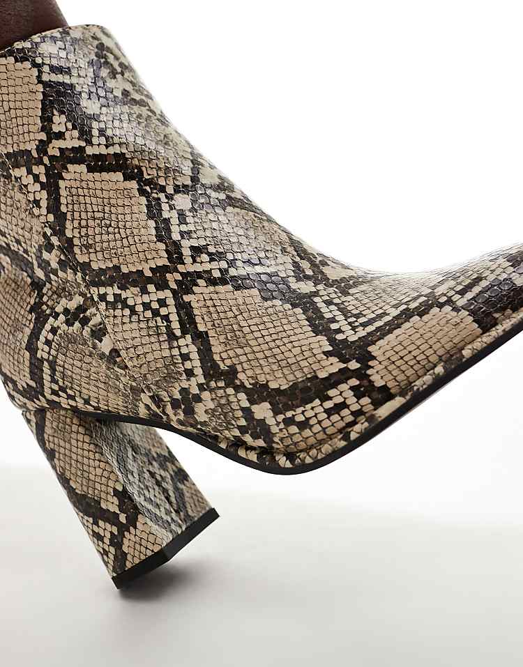 https://images.asos-media.com/products/london-rebel-maddie-wide-fit-block-heel-ankle-boots-in-snake/206780454-2?$n_750w$&wid=750&fit=constrain