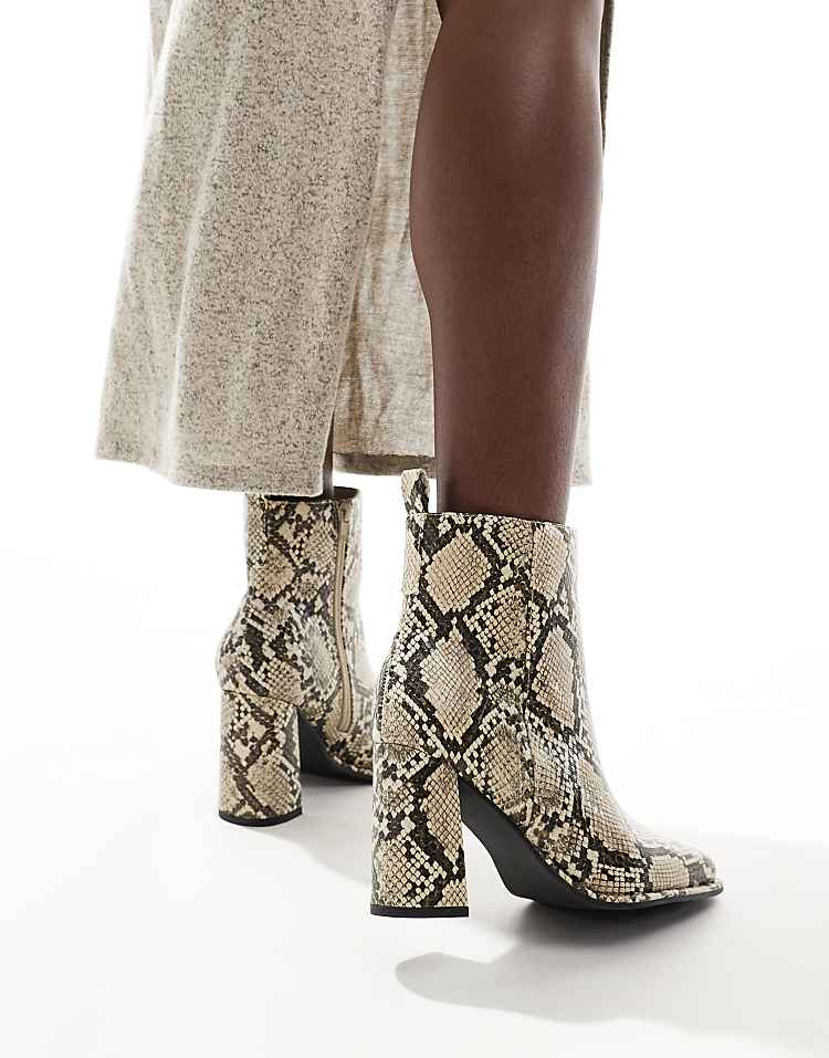 https://images.asos-media.com/products/london-rebel-maddie-wide-fit-block-heel-ankle-boots-in-snake/206780454-3?$n_750w$&wid=750&fit=constrain