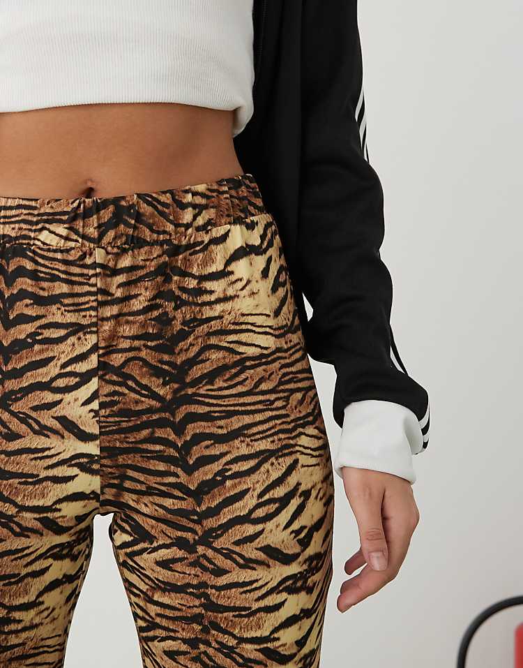 https://images.asos-media.com/products/noisy-may-tiger-print-flare-pants-in-brown/206879734-5?$n_750w$&wid=750&fit=constrain