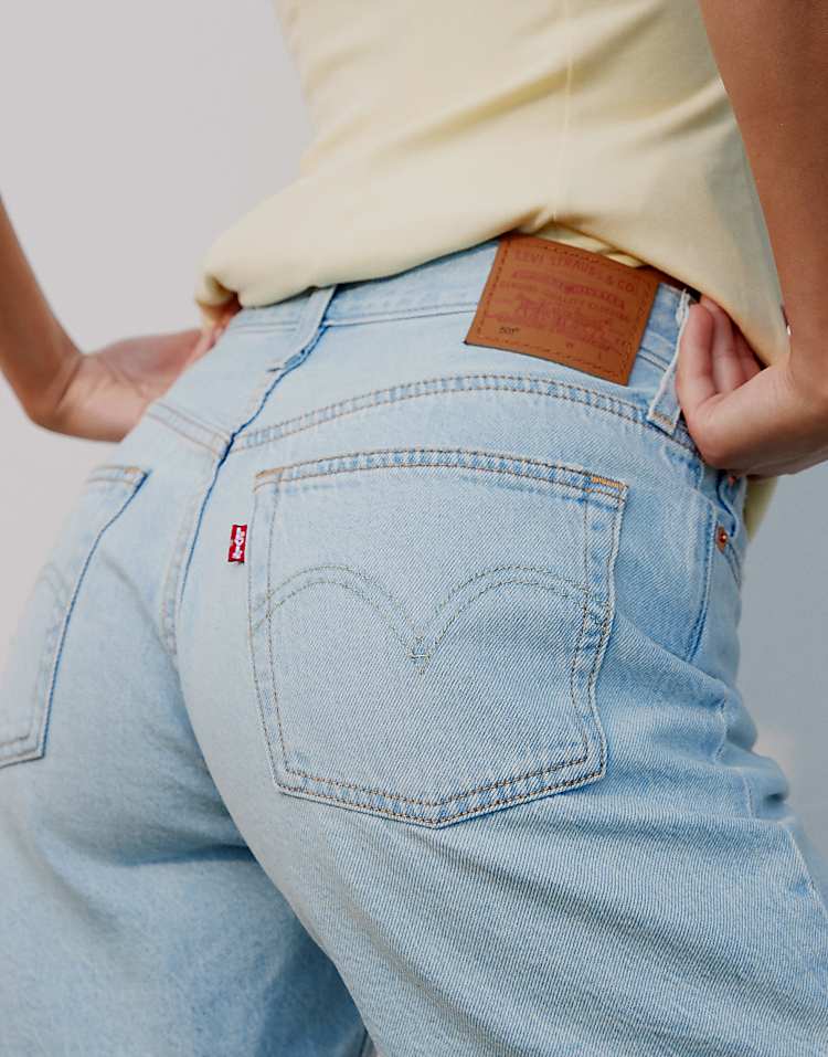 https://images.asos-media.com/products/levis-501-mid-thigh-low-waisted-denim-shorts-in-light-wash/207073339-4?$n_750w$&wid=750&fit=constrain