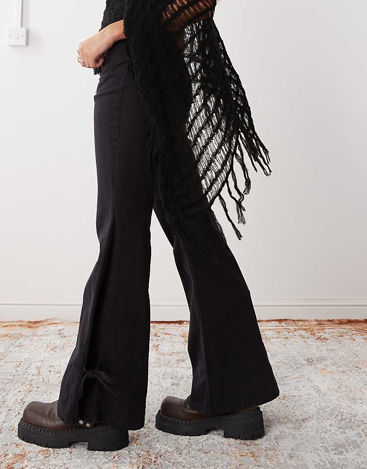 https://images.asos-media.com/products/monki-wide-leg-pants-with-tie-bow-detail-in-washed-black/207401225-2?$n_750w$&wid=750&fit=constrain