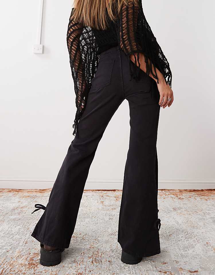 https://images.asos-media.com/products/monki-wide-leg-pants-with-tie-bow-detail-in-washed-black/207401225-4?$n_750w$&wid=750&fit=constrain