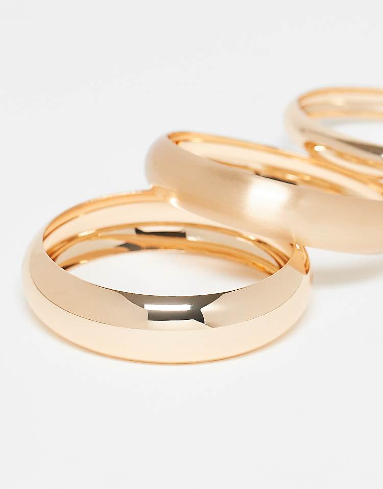 https://images.asos-media.com/products/asos-design-pack-of-3-bangles-in-gold-tone/208583168-3?$n_750w$&wid=750&fit=constrain