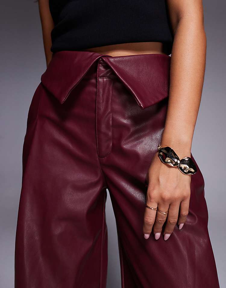 https://images.asos-media.com/products/asos-design-leather-look-wide-leg-pants-with-fold-over-waist-detail-in-burgundy/208657465-2?$n_750w$&wid=750&fit=constrain