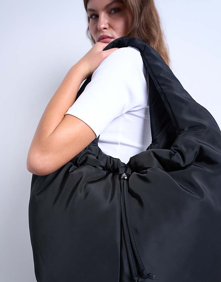 https://images.asos-media.com/products/topshop-sia-ruched-nylon-shoulder-bag-in-black/208737205-3?$n_750w$&wid=750&fit=constrain