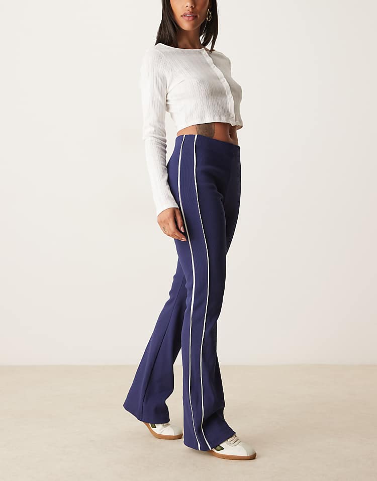 https://images.asos-media.com/products/asos-design-rib-knit-kick-flare-pants-with-piping-in-navy-and-cream/208865752-3?$n_750w$&wid=750&fit=constrain