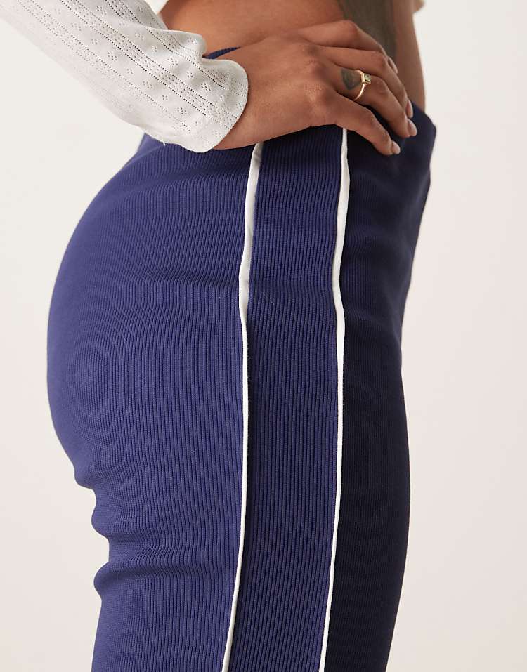 https://images.asos-media.com/products/asos-design-rib-knit-kick-flare-pants-with-piping-in-navy-and-cream/208865752-4?$n_750w$&wid=750&fit=constrain