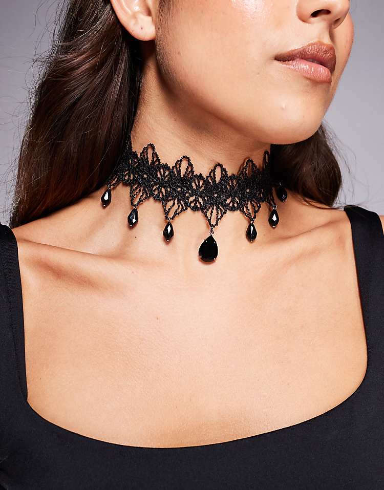 https://images.asos-media.com/products/asos-design-halloween-choker-with-lace-details-faux-stone-pendants-in-black/209079251-1-black?$n_750w$&wid=750&fit=constrain