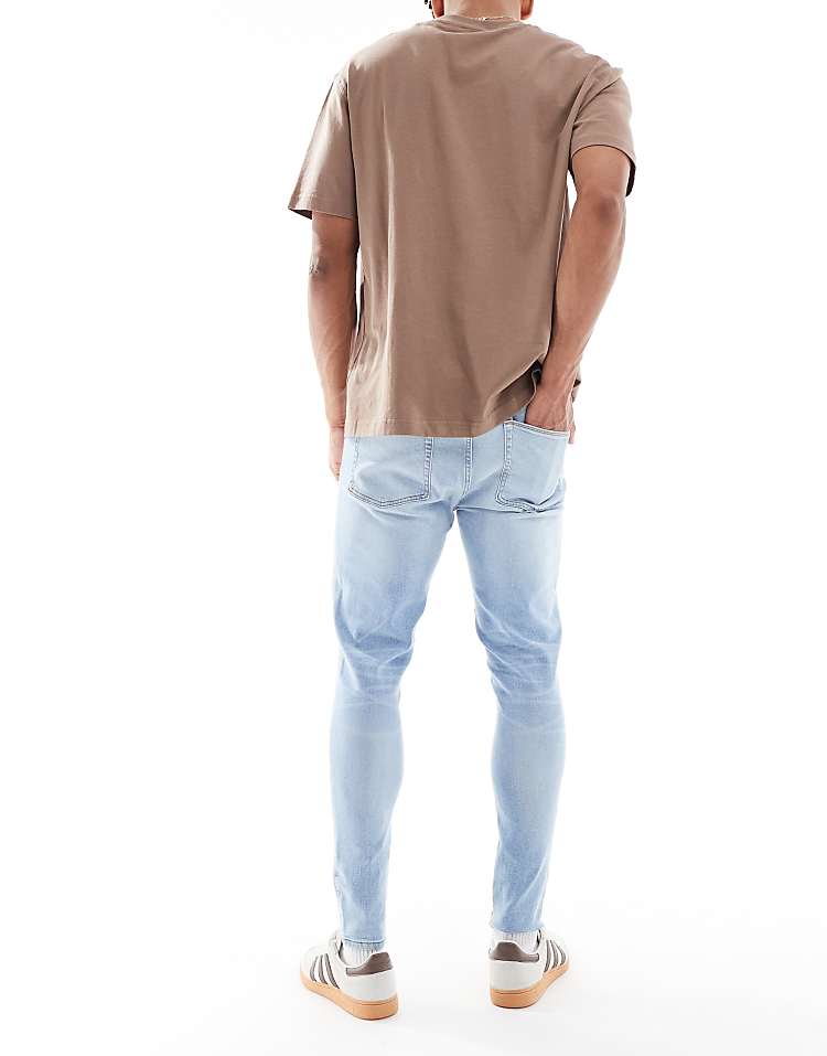 https://images.asos-media.com/products/asos-design-power-stretch-jeans-in-light-wash-blue/209122535-3?$n_750w$&wid=750&fit=constrain