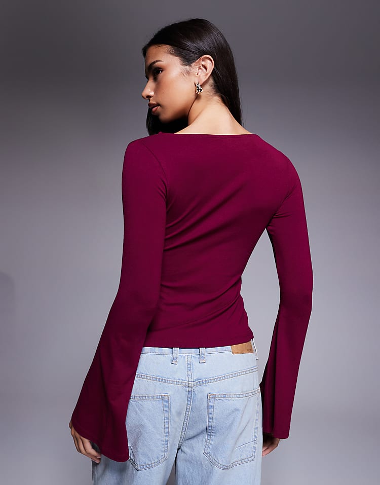 https://images.asos-media.com/products/asos-design-godet-insert-long-sleeve-top-with-fluted-sleeves-in-plum/209485511-4?$n_750w$&wid=750&fit=constrain