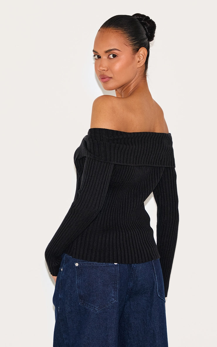 https://cdn-img.prettylittlething.com/2/e/f/4/2ef4876fb495bfe4a8d2b58bae7a265d83638e20_CNL6064_2_black_rib_knit_fold_over_button_up_top.jpg