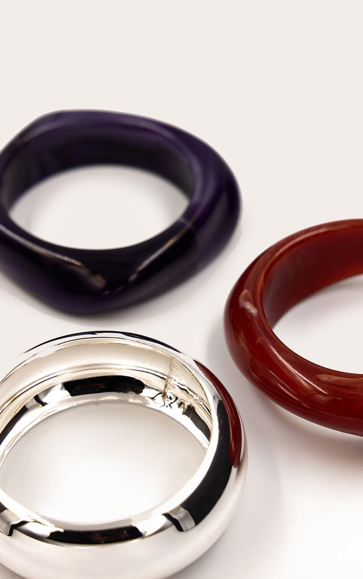 https://cdn-img.prettylittlething.com/8/e/1/a/8e1a81b9465384abbcb4388f35c085375101aa6a_CNO2918_3_plum_silver_resin_bangle_multi_pack.jpg
