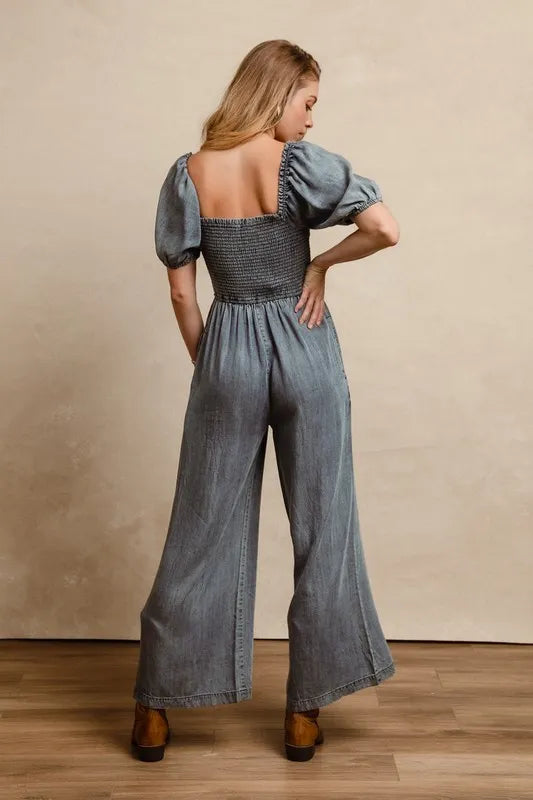 BiBi Smocked Washed Puff Sleeve Square Neck Denim Jumpsuit Medium / S Medium / M Medium / L Medium / S-Medium / M-Medium / L-Medium / XL-