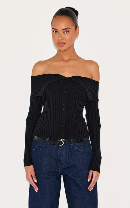 https://cdn-img.prettylittlething.com/0/7/6/9/0769e638ee488ba90507f8bdfea5dfa04274ab08_CNL6064_1_black_rib_knit_fold_over_button_up_top.jpg