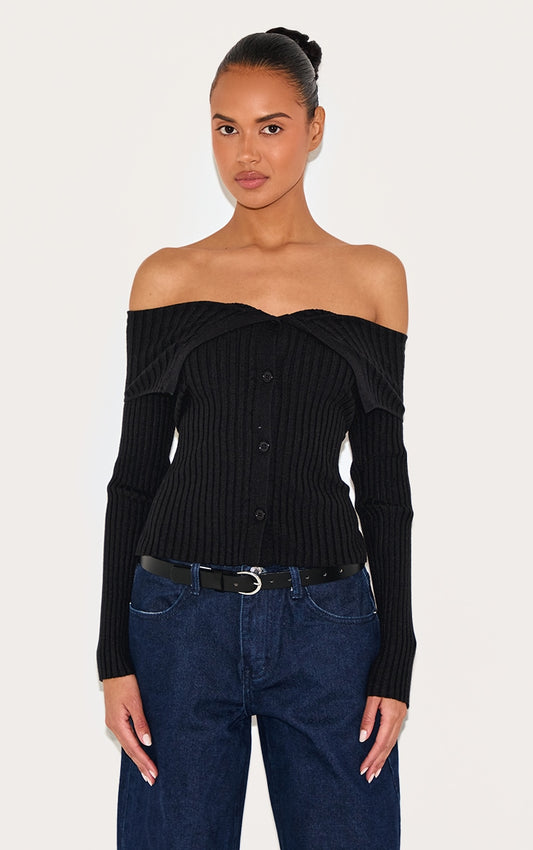https://cdn-img.prettylittlething.com/0/7/6/9/0769e638ee488ba90507f8bdfea5dfa04274ab08_CNL6064_1_black_rib_knit_fold_over_button_up_top.jpg