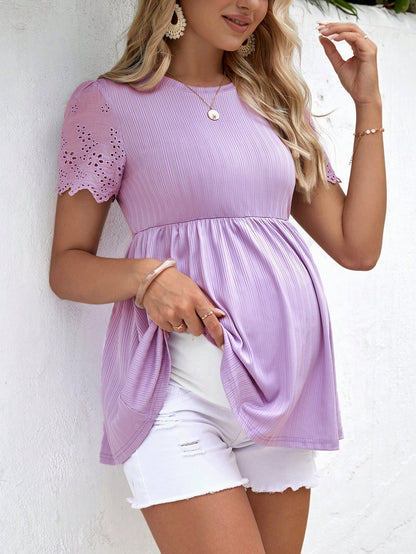 Chic Maternity Eyelet Embroidery Peplum Tee - Comfort Meets Style