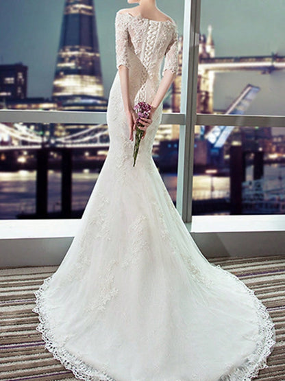 Sleek Elegance: Fishtail Wedding Dress with Long Train – Perfect for the Modern Bride