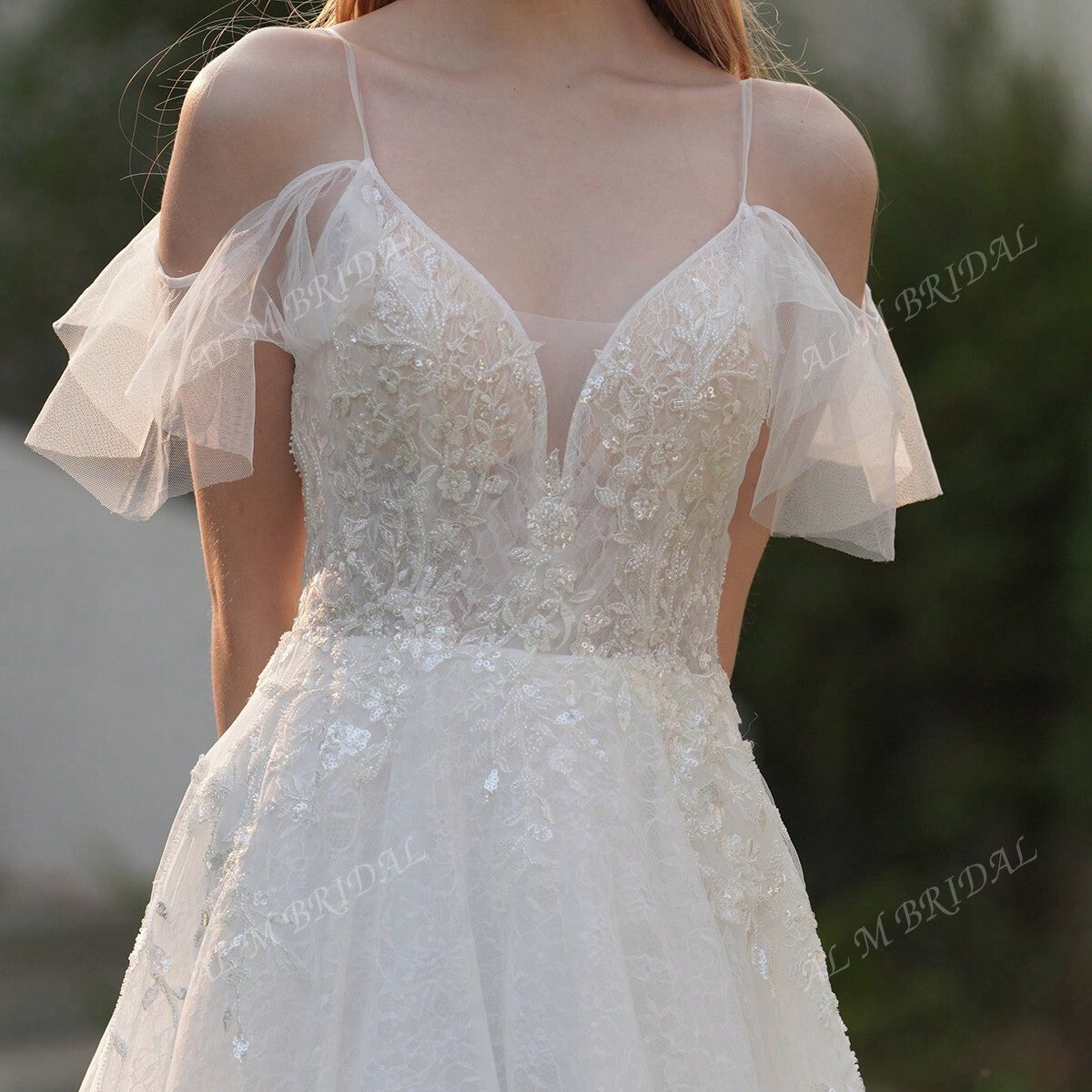 Elegance Redefined: V-Neck Lace Beaded Wedding Dress with Chic Slit Detail