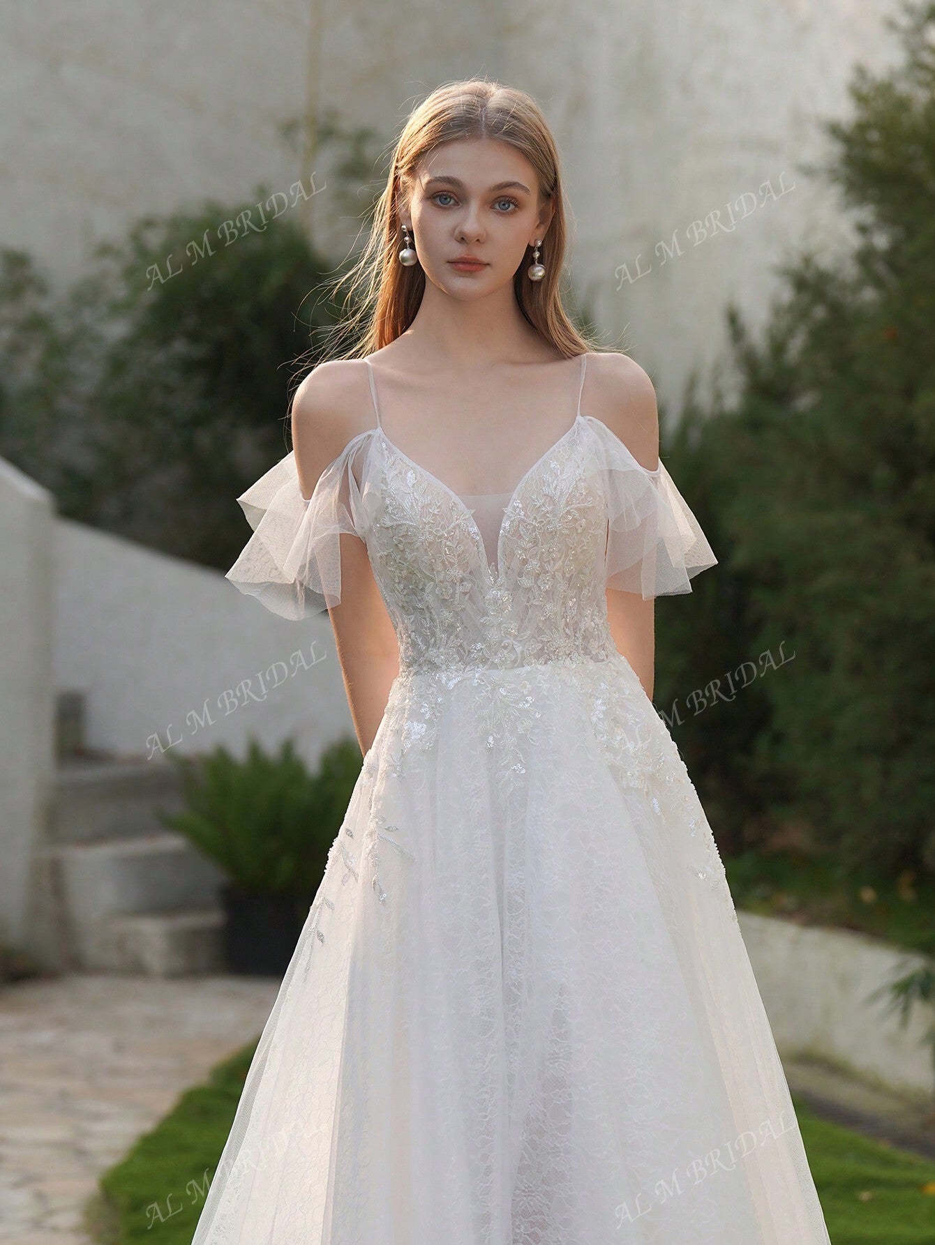 Elegance Redefined: V-Neck Lace Beaded Wedding Dress with Chic Slit Detail