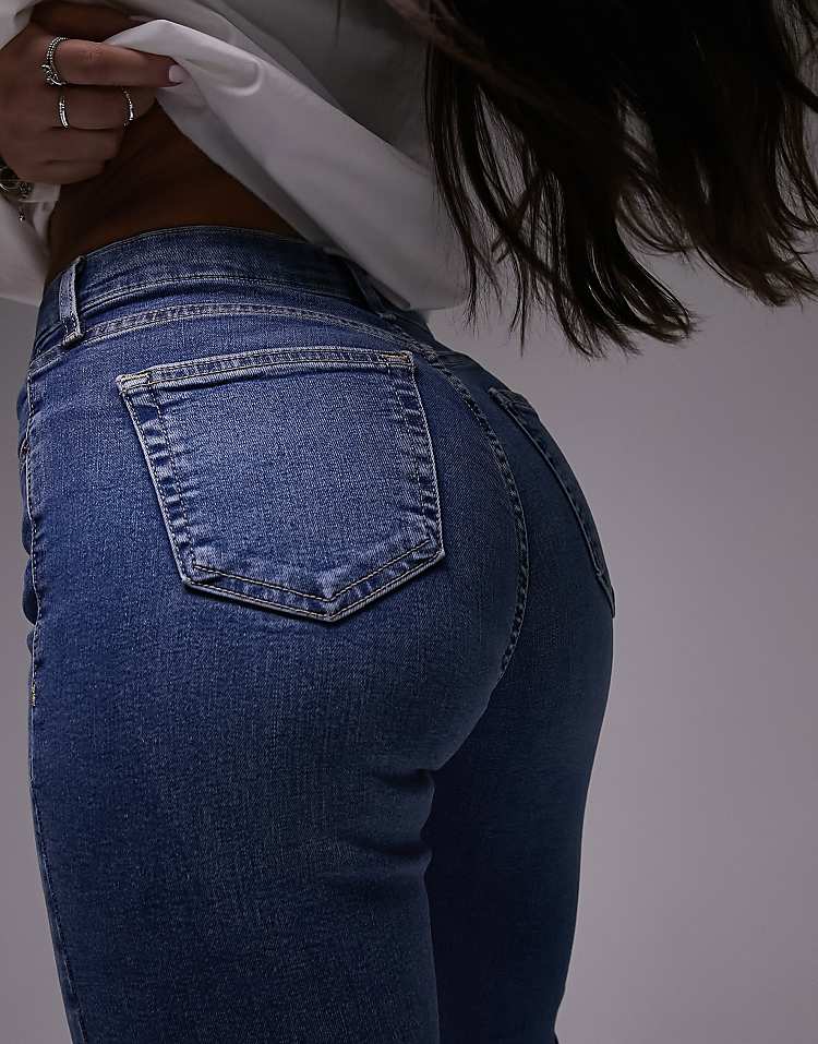 https://images.asos-media.com/products/topshop-hourglass-jamie-flare-high-rise-jeans-in-mid-blue/202355870-2?$n_750w$&wid=750&fit=constrain