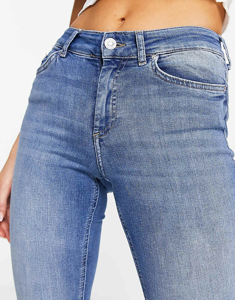 https://images.asos-media.com/products/only-blush-mid-waist-flare-jeans-in-medium-blue/202520327-3?$n_750w$&wid=750&fit=constrain