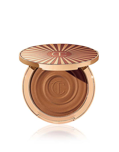 https://images.asos-media.com/products/charlotte-tilbury-beautiful-skin-sun-kissed-glow-bronzer-medium/203177780-1-medium?$n_750w$&wid=750&fit=constrain
