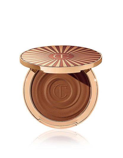 https://images.asos-media.com/products/charlotte-tilbury-beautiful-skin-sun-kissed-glow-bronzer-tan/203177792-1-tan?$n_750w$&wid=750&fit=constrain