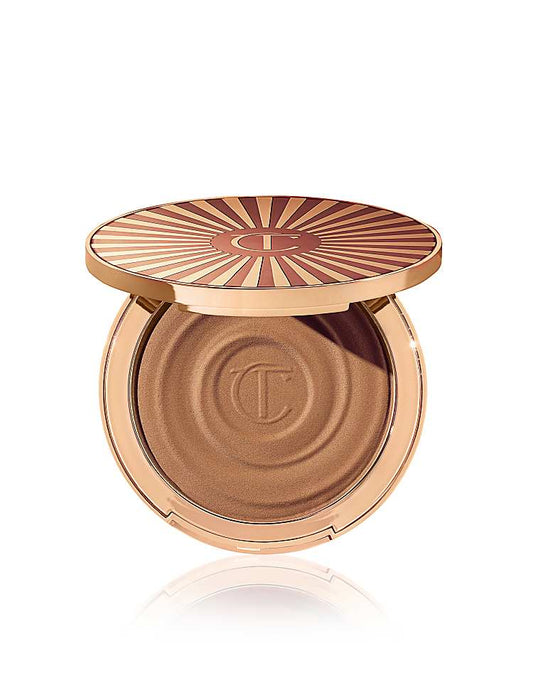 https://images.asos-media.com/products/charlotte-tilbury-beautiful-skin-sun-kissed-glow-bronzer-fair/203177795-1-fair?$n_750w$&wid=750&fit=constrain