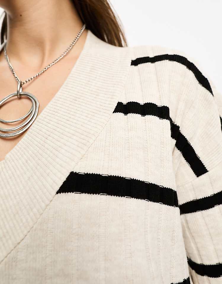 https://images.asos-media.com/products/only-knitted-v-neck-midaxi-dress-in-cream-and-black-stripe/205148679-2?$n_750w$&wid=750&fit=constrain