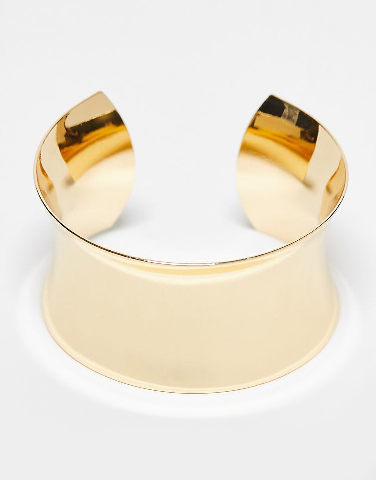 https://images.asos-media.com/products/asos-design-wide-cuff-bracelet-in-gold-tone/205502764-1-gold?$n_750w$&wid=750&fit=constrain
