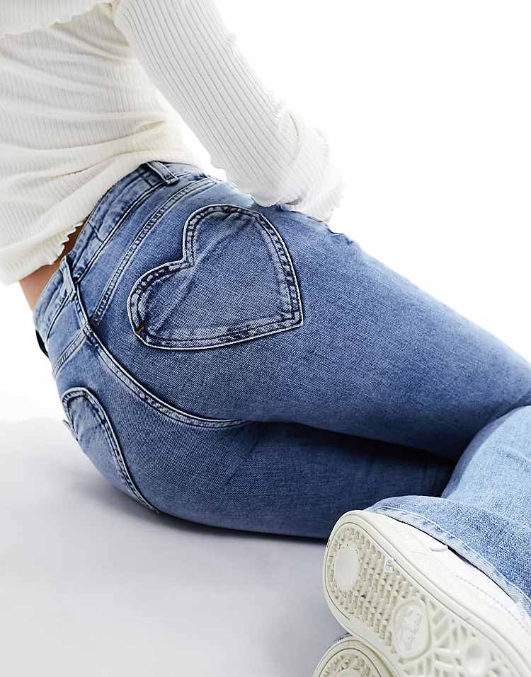 https://images.asos-media.com/products/miss-selfridge-heart-pocket-flare-jeans-in-mid-wash/205545021-4?$n_750w$&wid=750&fit=constrain