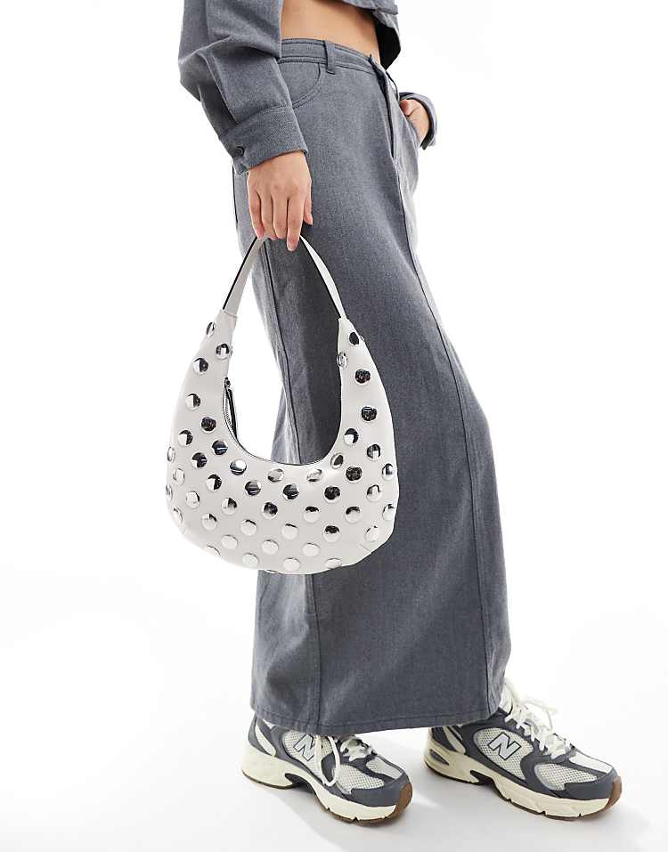 https://images.asos-media.com/products/asos-design-curved-shoulder-bag-with-flat-studs-in-stone/206466916-3?$n_750w$&wid=750&fit=constrain