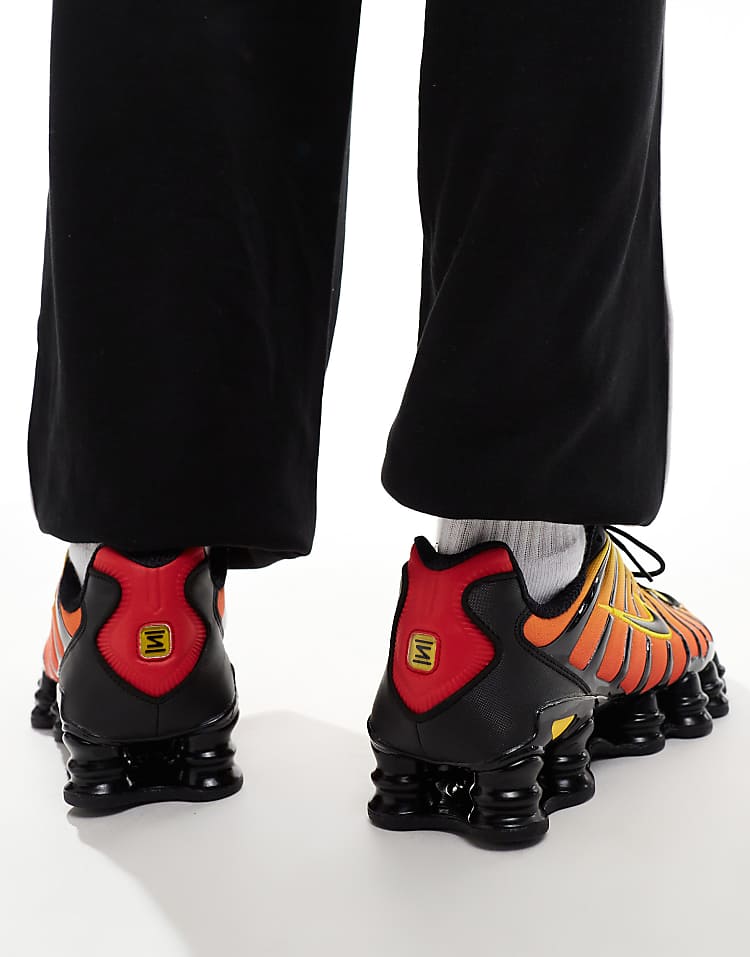 https://images.asos-media.com/products/nike-shox-tl-sneakers-in-black-and-red/206574554-5?$n_750w$&wid=750&fit=constrain