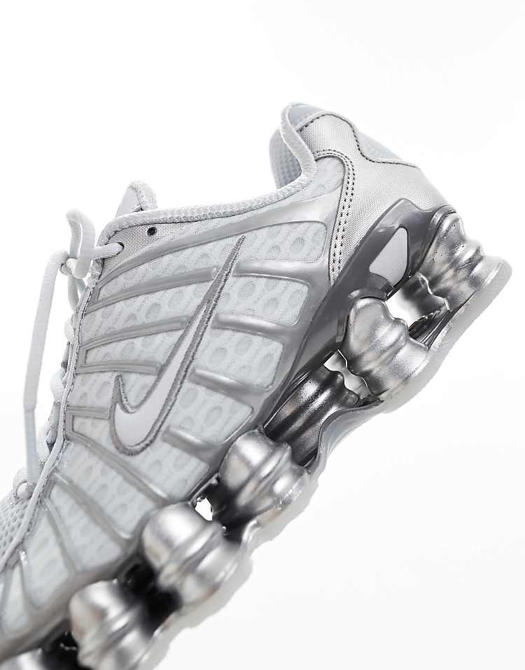 https://images.asos-media.com/products/nike-shox-tl-sneakers-in-gray-and-silver/206617504-4?$n_750w$&wid=750&fit=constrain