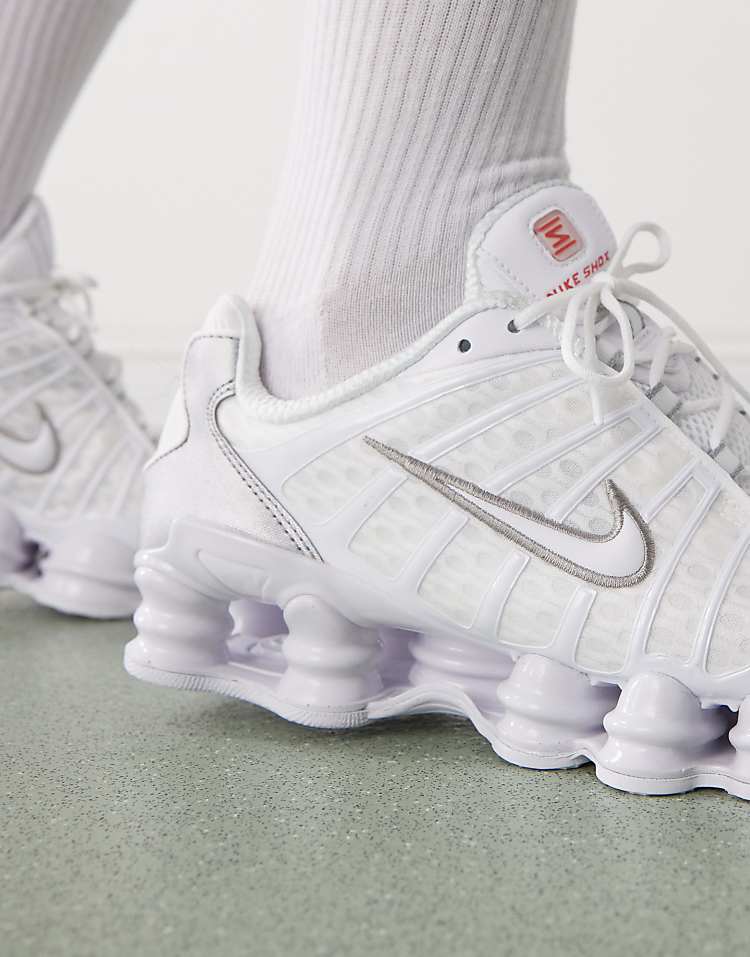https://images.asos-media.com/products/nike-shox-tl-sneakers-in-white-and-silver/206963980-4?$n_750w$&wid=750&fit=constrain
