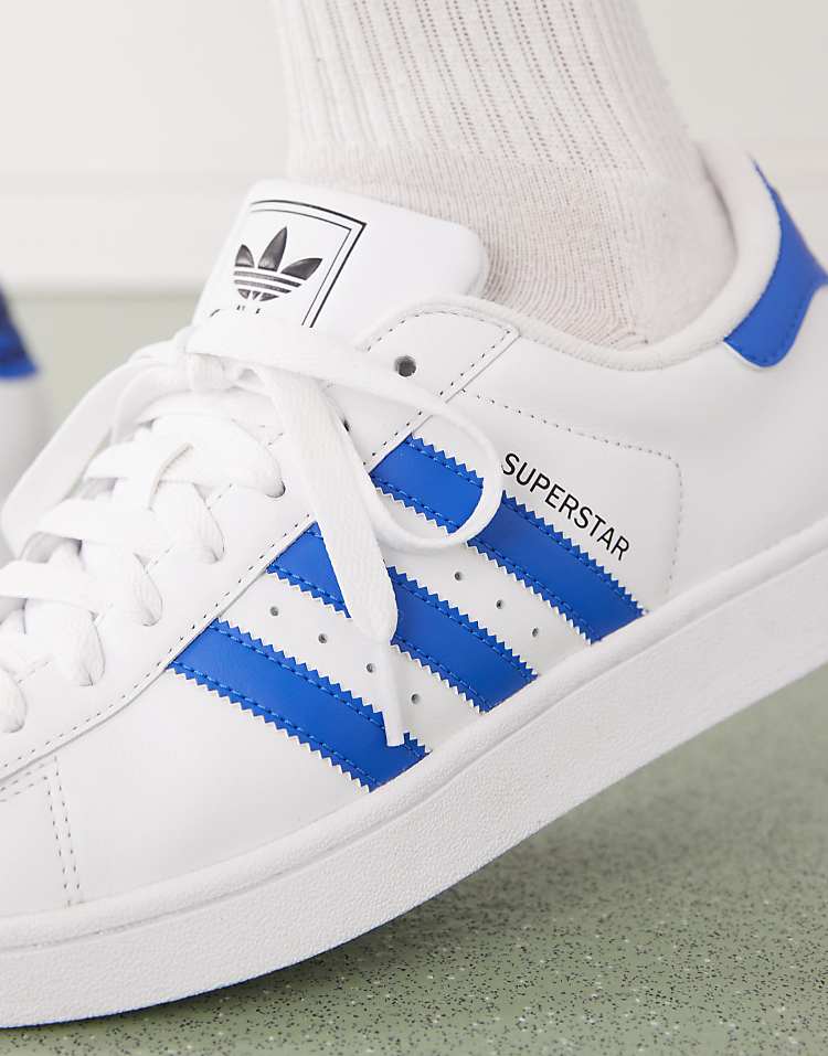https://images.asos-media.com/products/adidas-originals-superstar-ii-sneakers-in-white-and-blue/207048713-3?$n_750w$&wid=750&fit=constrain