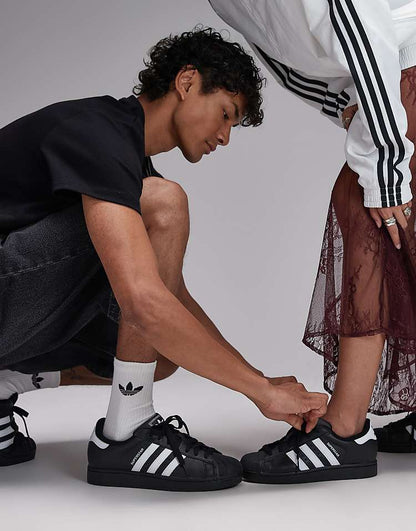 https://images.asos-media.com/products/adidas-originals-superstar-ii-sneakers-in-black-and-white/207114867-1-black?$n_750w$&wid=750&fit=constrain