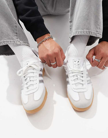 https://images.asos-media.com/products/adidas-originals-samba-sneakers-in-white-and-silver/207114896-1-white?$n_750w$&wid=750&fit=constrain