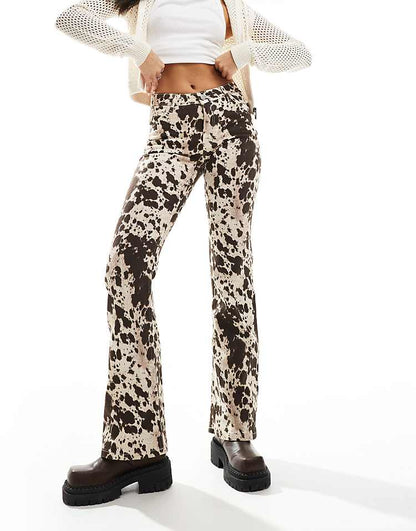 https://images.asos-media.com/products/monki-regular-fit-flare-cotton-pants-in-brown-cow-print/207124154-5?$n_750w$&wid=750&fit=constrain