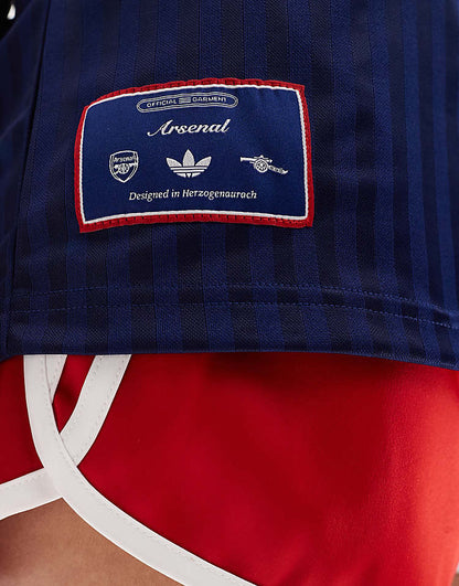 https://images.asos-media.com/products/adidas-football-arsenal-icons-t-shirt-in-navy-and-red/207197235-3?$n_750w$&wid=750&fit=constrain