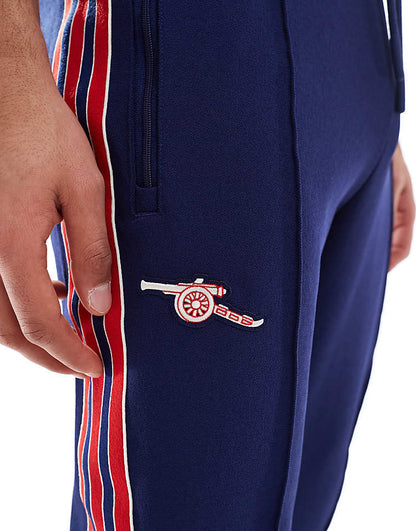 https://images.asos-media.com/products/adidas-football-arsenal-icons-trackpants-in-navy-and-red/207197386-3?$n_750w$&wid=750&fit=constrain