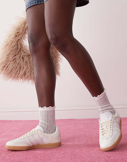 https://images.asos-media.com/products/adidas-originals-samba-sneakers-in-white-and-cream/207405510-1-white?$n_750w$&wid=750&fit=constrain
