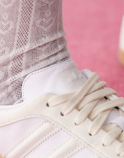 https://images.asos-media.com/products/adidas-originals-samba-sneakers-in-white-and-cream/207405510-3?$n_750w$&wid=750&fit=constrain