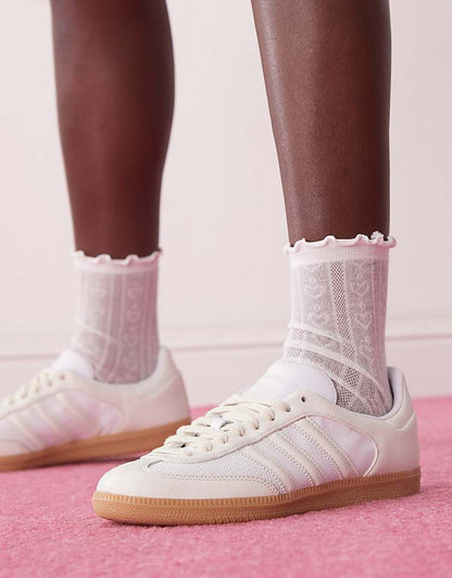 https://images.asos-media.com/products/adidas-originals-samba-sneakers-in-white-and-cream/207405510-5?$n_750w$&wid=750&fit=constrain