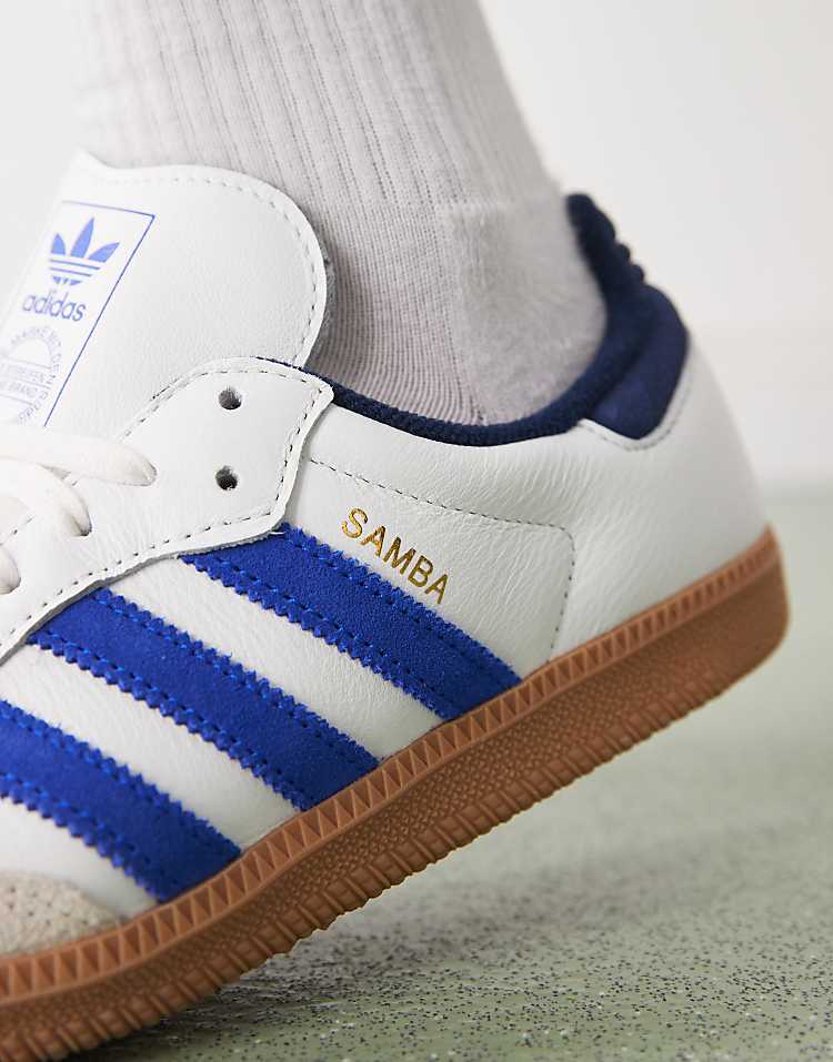 https://images.asos-media.com/products/adidas-originals-samba-og-sneakers-in-white-and-dark-blue/207406169-3?$n_750w$&wid=750&fit=constrain