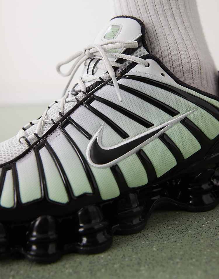 https://images.asos-media.com/products/nike-shox-tl-sneakers-in-black-and-green/207494918-4?$n_750w$&wid=750&fit=constrain