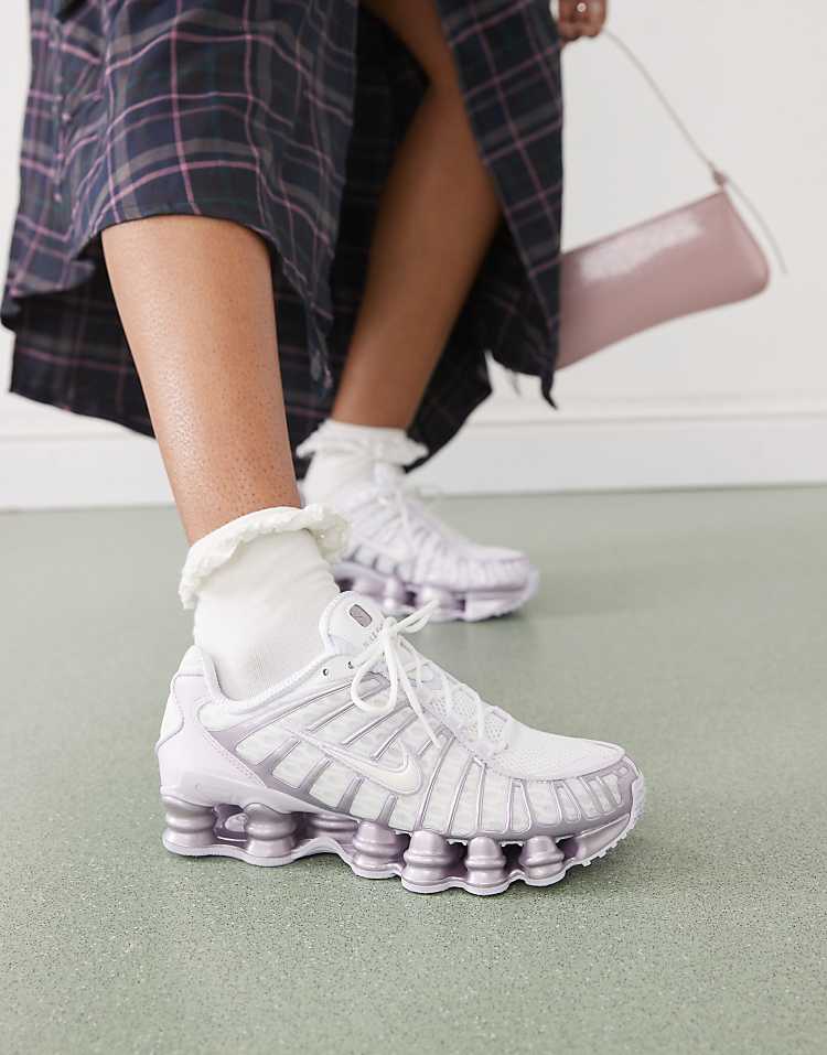 https://images.asos-media.com/products/nike-shox-tl-sneakers-in-white-and-purple/207499163-1-white?$n_750w$&wid=750&fit=constrain